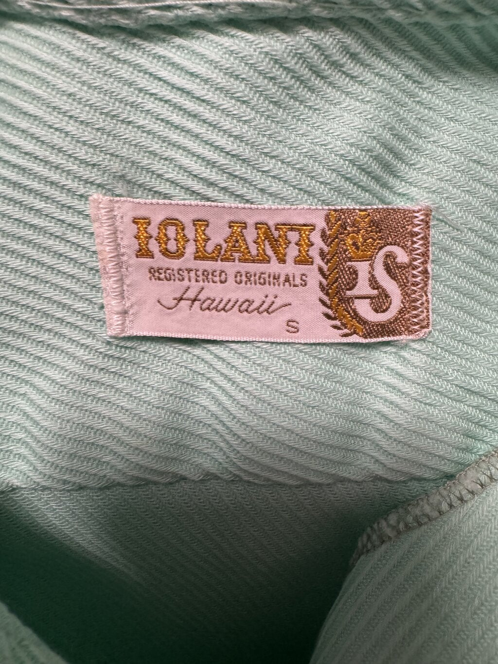 1960s Iolani Tiki Border Shirt – Pale Mint Textured Knit with Tribal Motif (S)