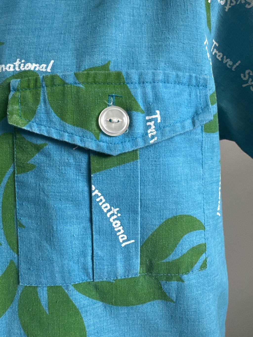 1950s Hukilau Fashions Four-Pocket Barkcloth Shirt – Blue Tropics with Military Edge